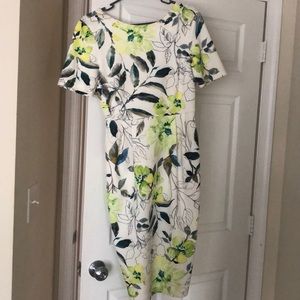 White dress with detailed pastel flowers